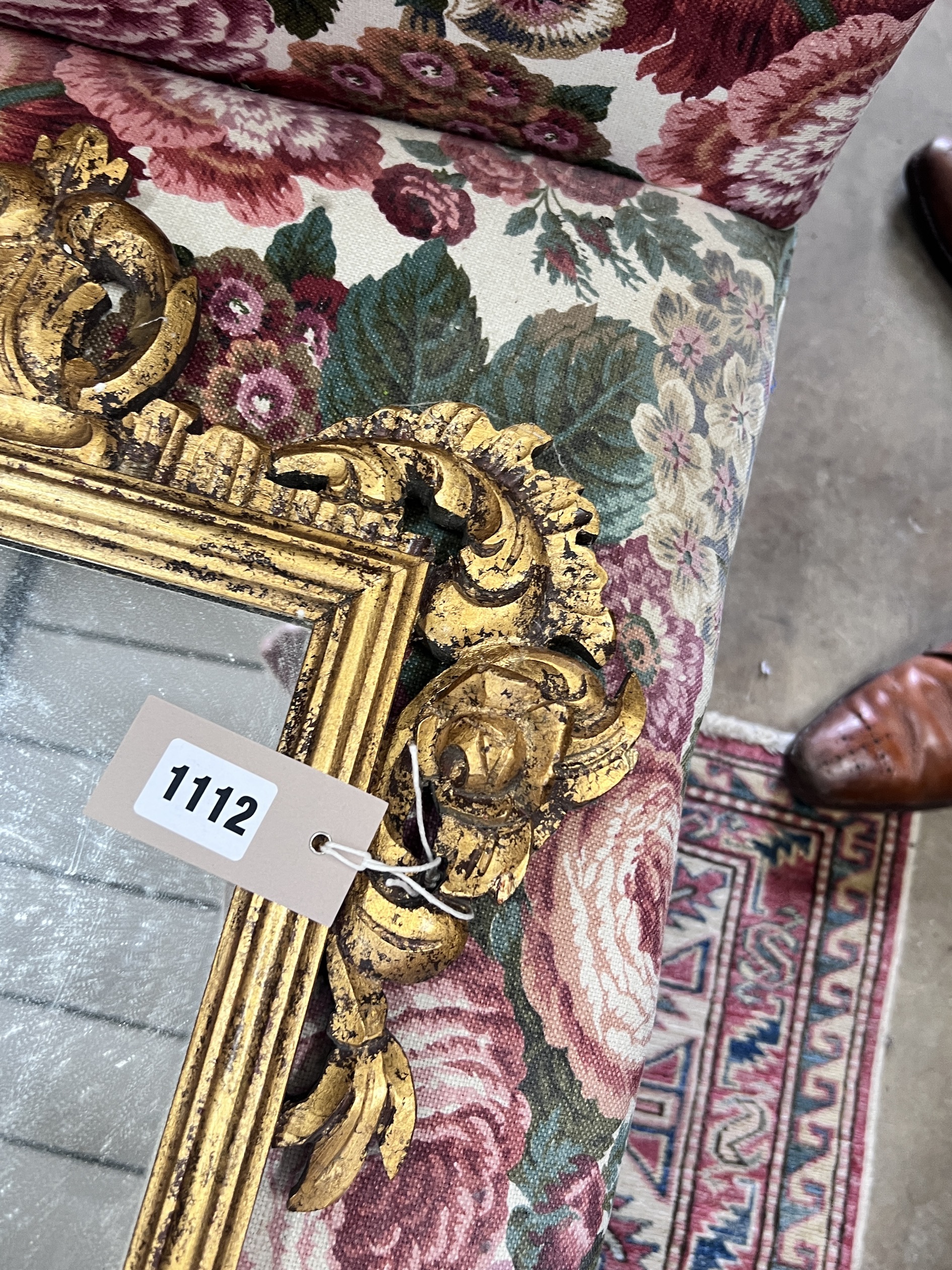 An 18th century style carved giltwood wall mirror, width 44cm, height 112cm